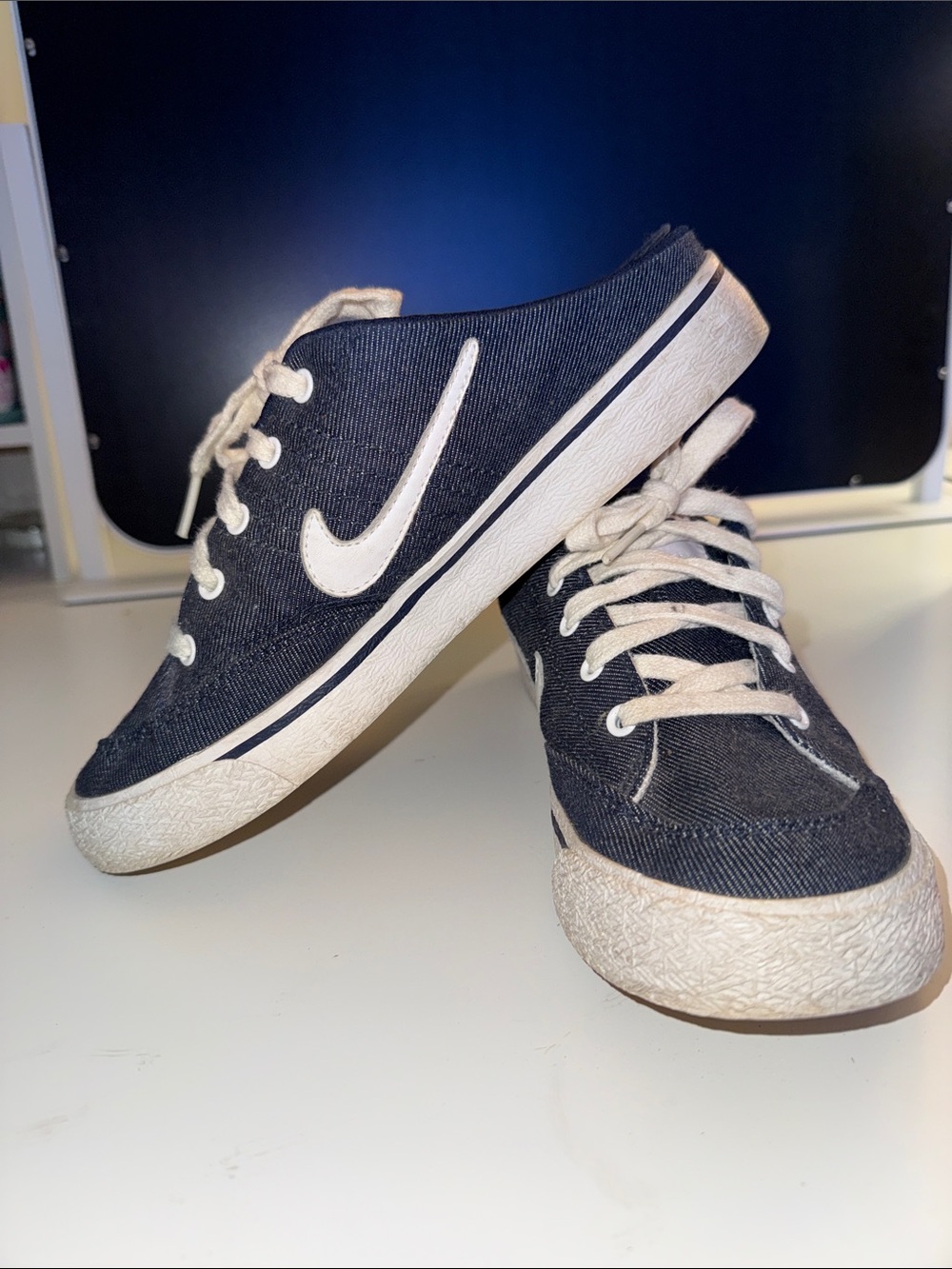 Nike Women's navy Canvas Sneakers with White Swoosh
